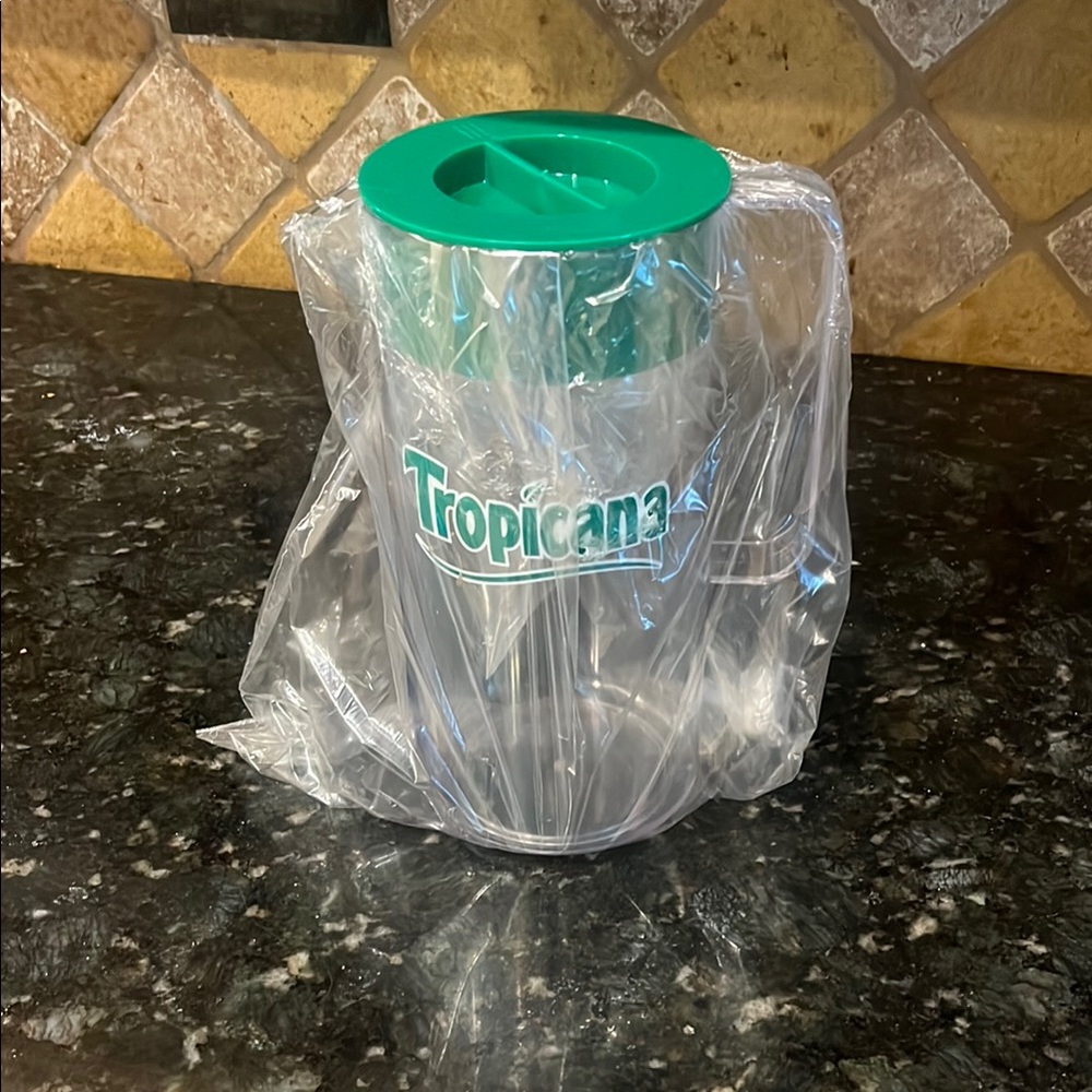 Tropicana Green and Clear Container